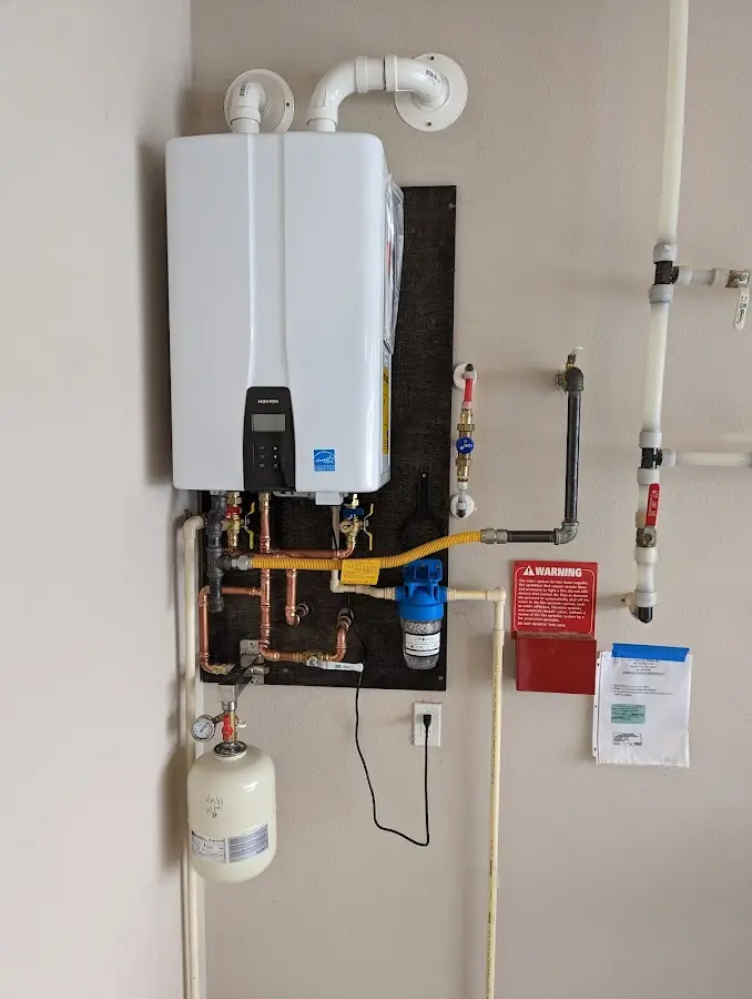 Professional plumber installing copper piping in a Napa home